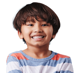 Smiling boy with straight brown hair wearing a striped shirt, arms crossed.